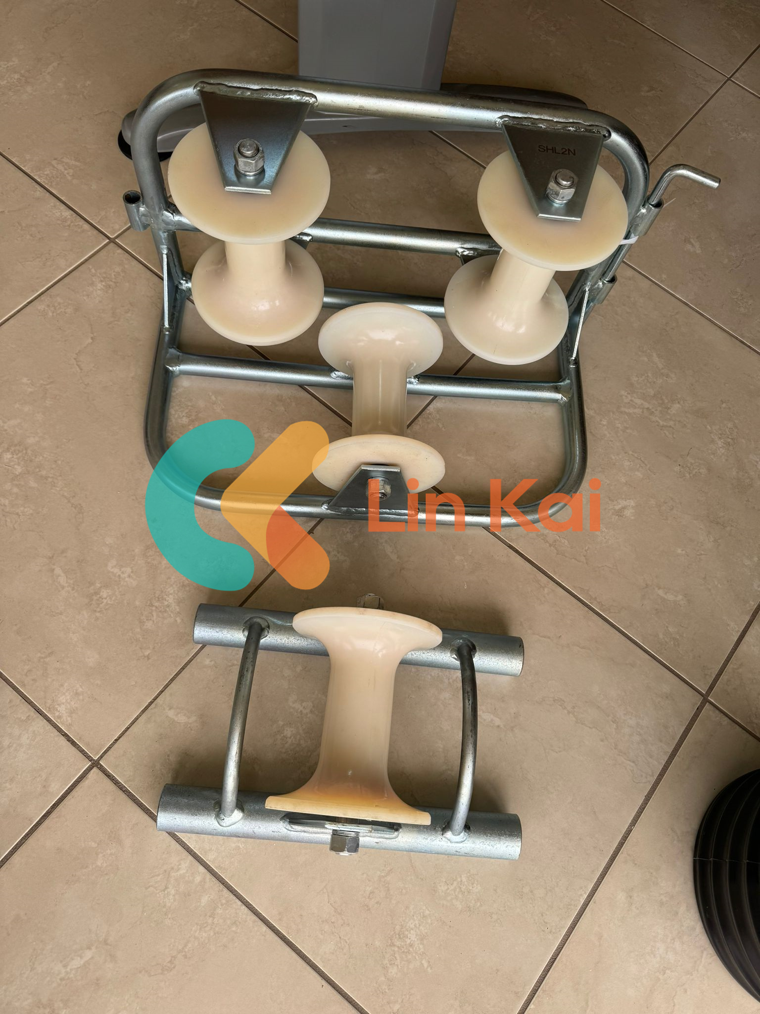 Kokios yra pagrindinės kabelio įžeminimo ritinėlio funkcijos?